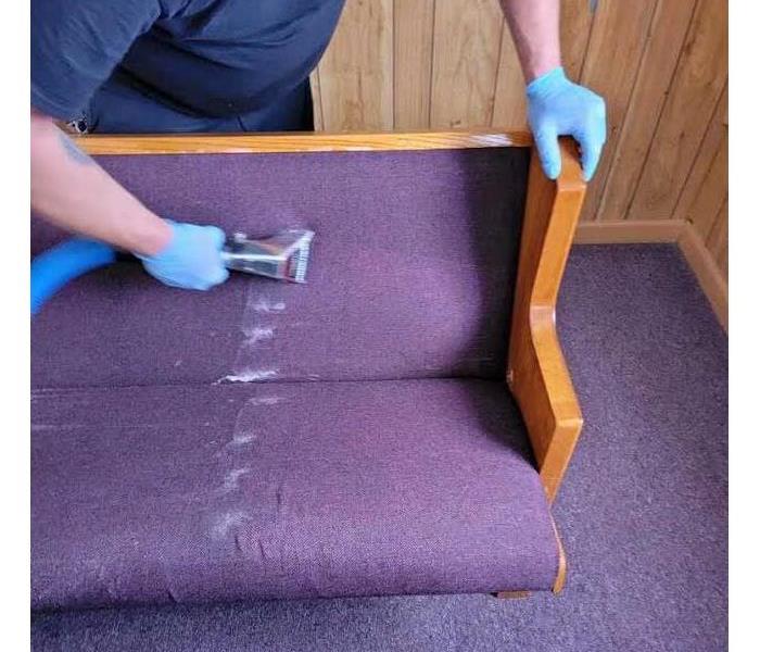 Church Pew Being Cleaned