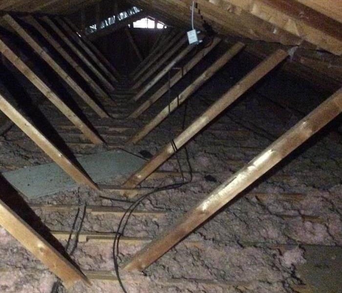 Attic before insulation removal