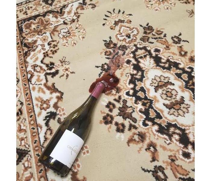 Red wine spilled on carpet